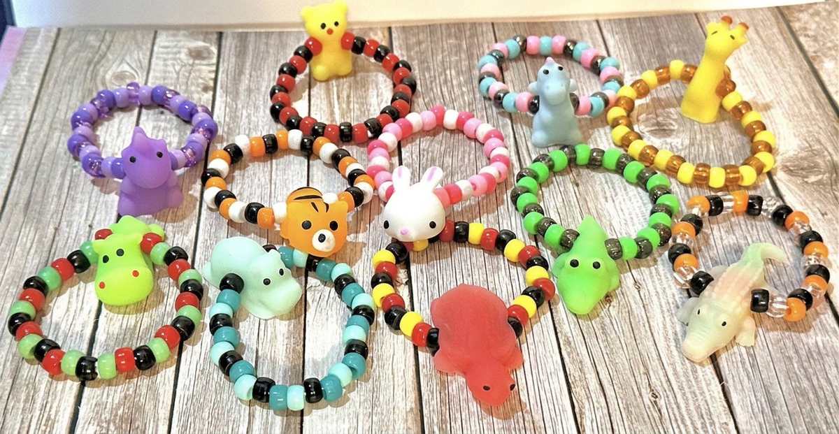 Squishy Animal & Fruit Charm Kandi Bracelets Table Display